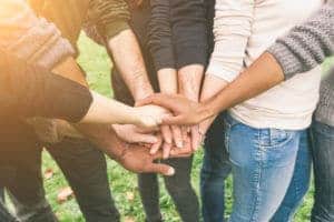 A group of college students forming a consensus.