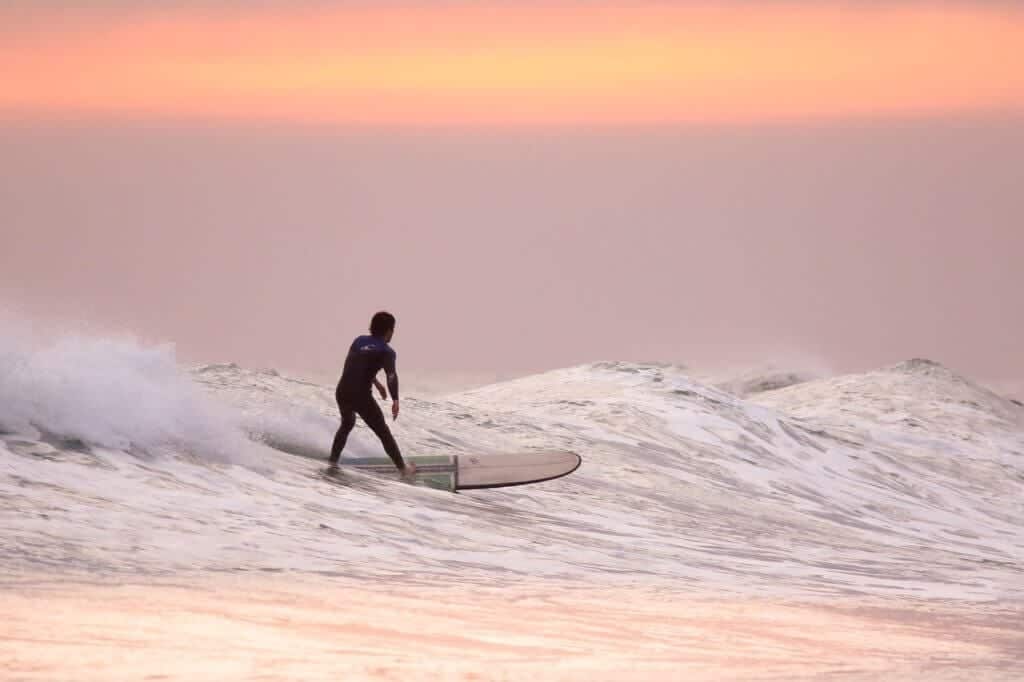 sunset surfer hawaii