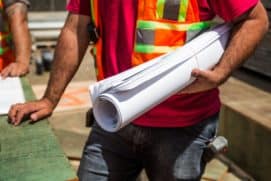 person holding drafting paper 544971 scaled