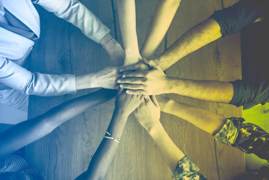 Hands together in consensus